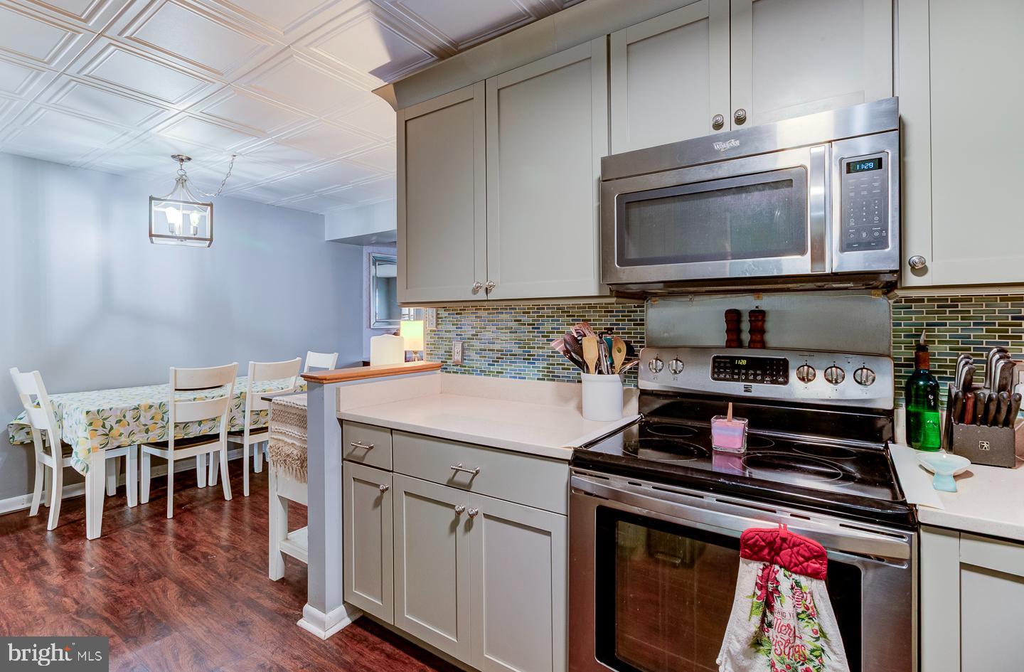 21 Louise Court Rising Sun, MD 21911 - Photo 10 of 25 a kitchen with stainless steel appliances granite countertop a stove and a microwave