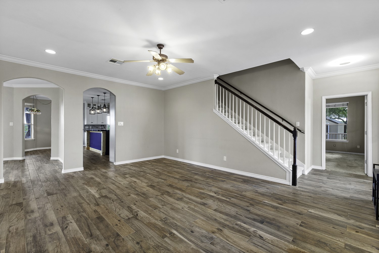 15020 Hero Way West Leander, TX 78641 - Photo 18 of 38 wooden floor in an empty room with a window