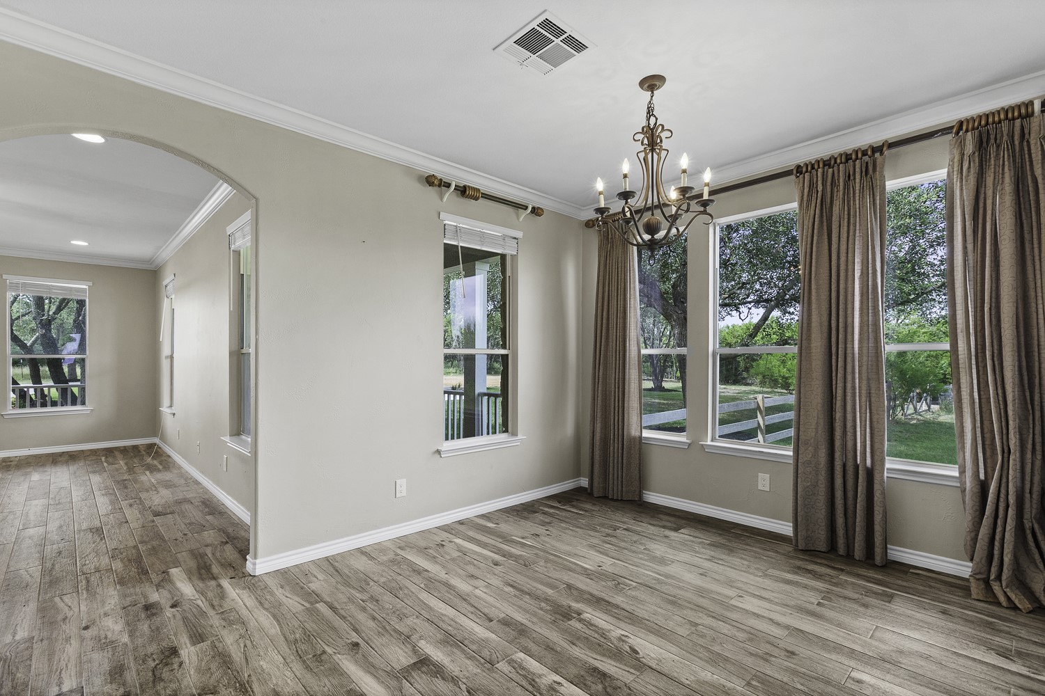 15020 Hero Way West Leander, TX 78641 - Photo 20 of 38 wooden floor in an empty room with a window