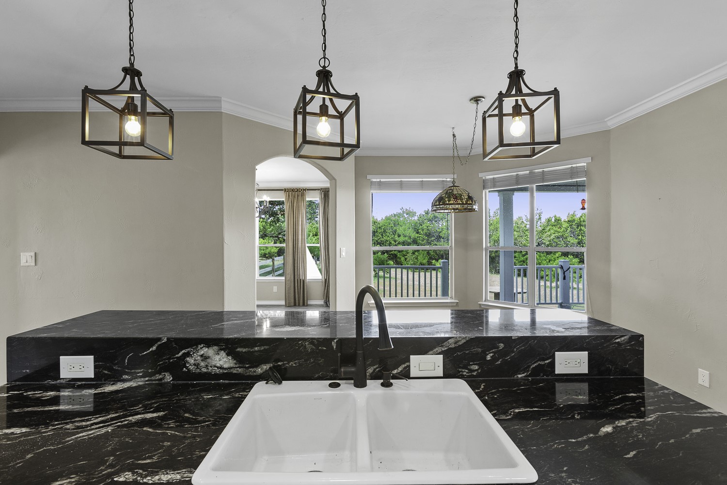 15020 Hero Way West Leander, TX 78641 - Photo 22 of 38 a kitchen with a counter space a sink and a window