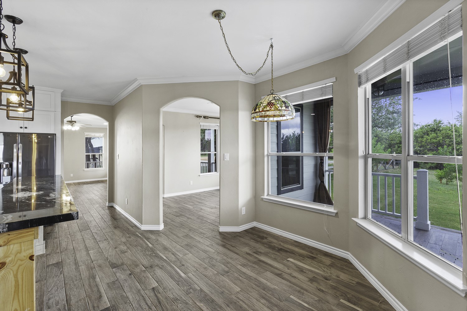 15020 Hero Way West Leander, TX 78641 - Photo 25 of 38 a view of empty room with wooden floor and fan
