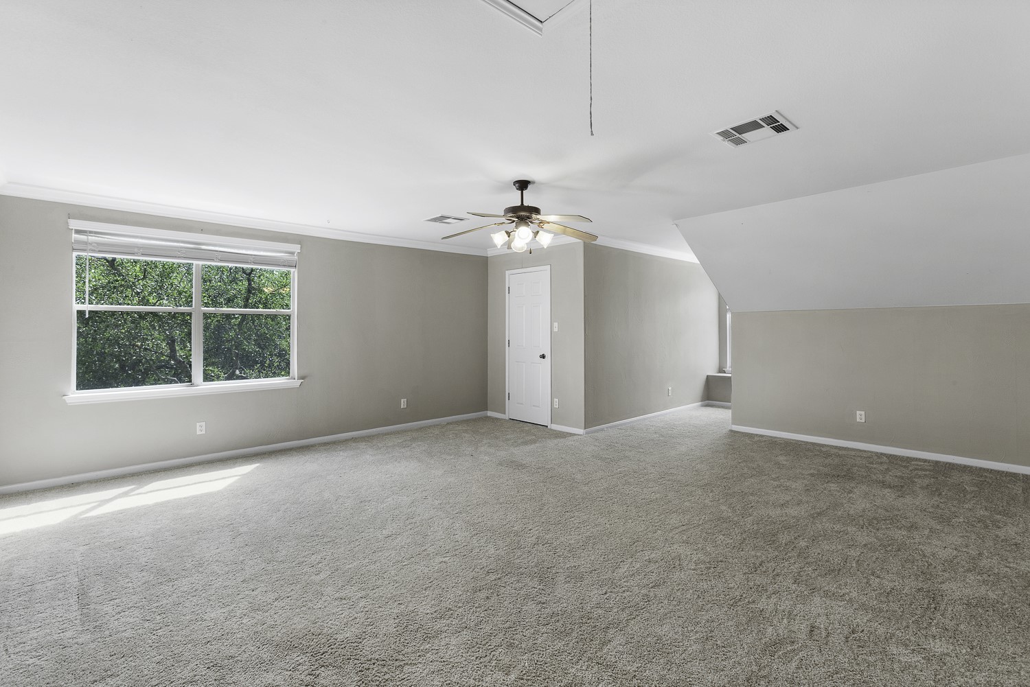 15020 Hero Way West Leander, TX 78641 - Photo 26 of 38 a view of a room with a ceiling fan and window
