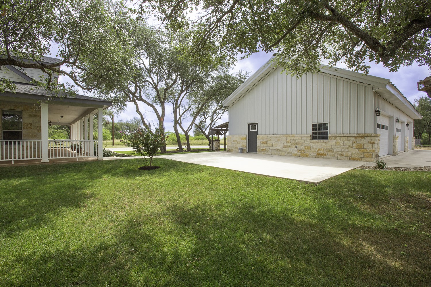 15020 Hero Way West Leander, TX 78641 - Photo 7 of 38 a front view of house with yard and trees