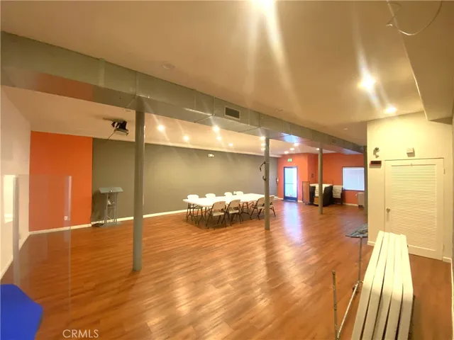 a view of a swimming pool and lounge chair