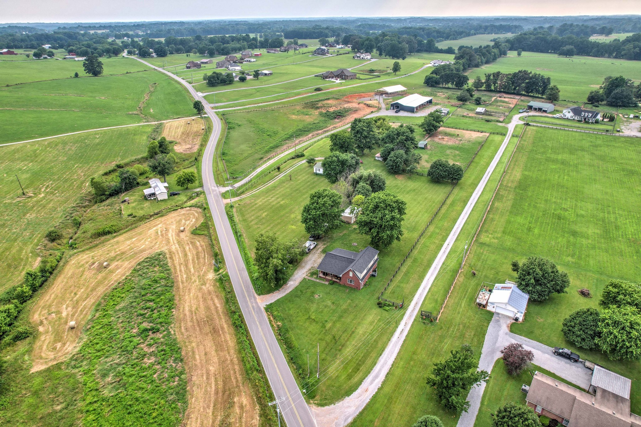 443 Halltown Road Portland, TN 37148 - Photo 16 of 49 an aerial view of a golf course with a lake view