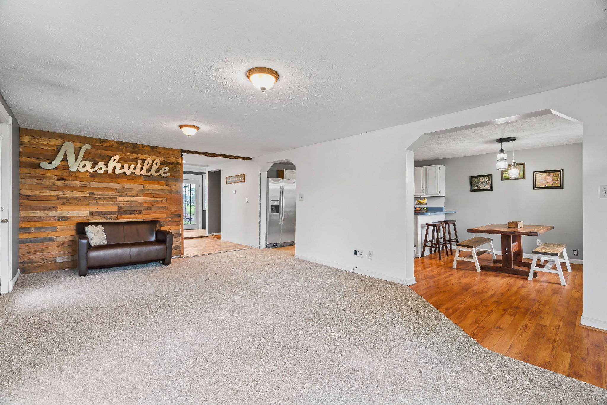 443 Halltown Road Portland, TN 37148 - Photo 20 of 49 a view of a livingroom with furniture and a flat screen tv