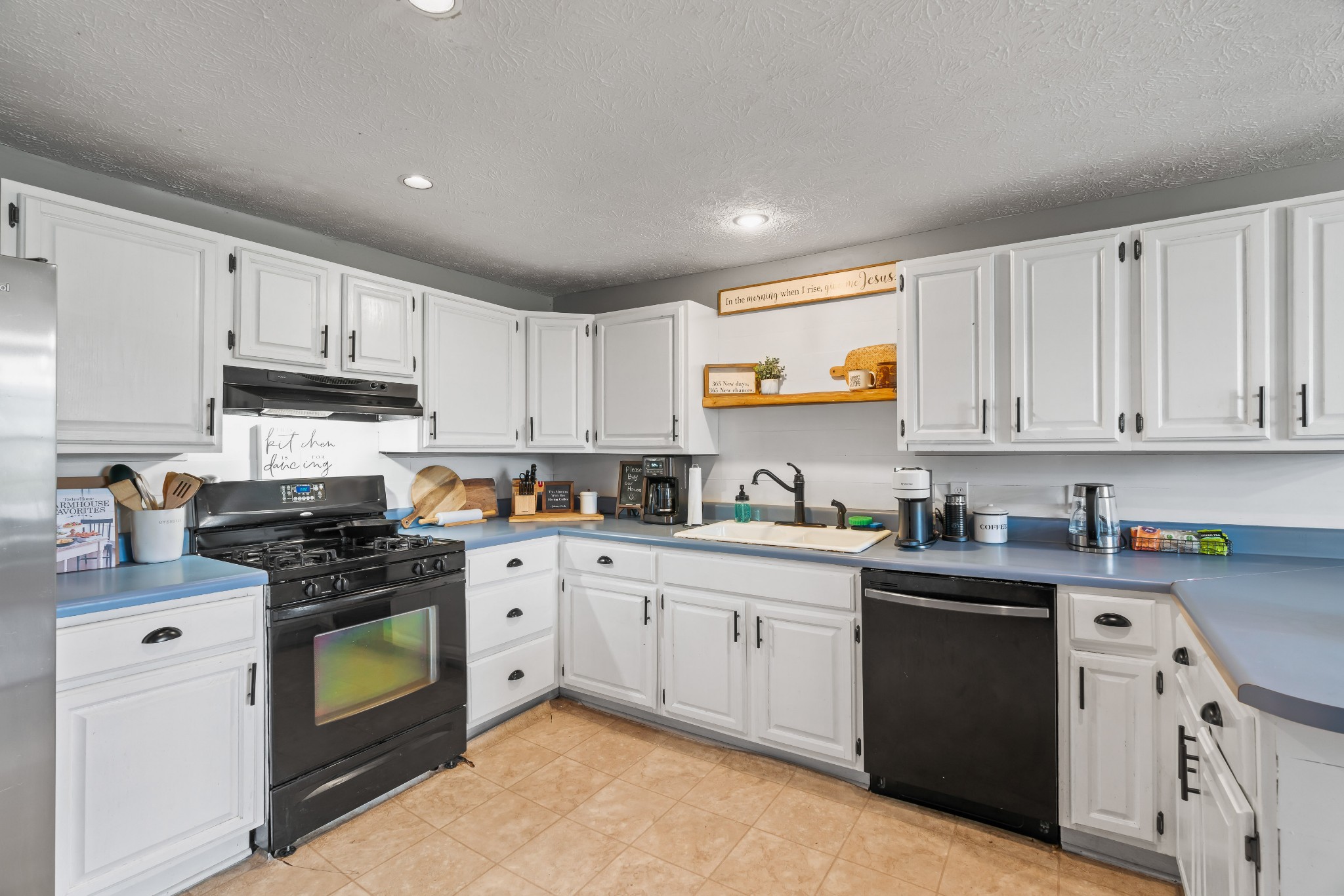 443 Halltown Road Portland, TN 37148 - Photo 22 of 49 a kitchen with cabinets white stainless steel appliances and sink
