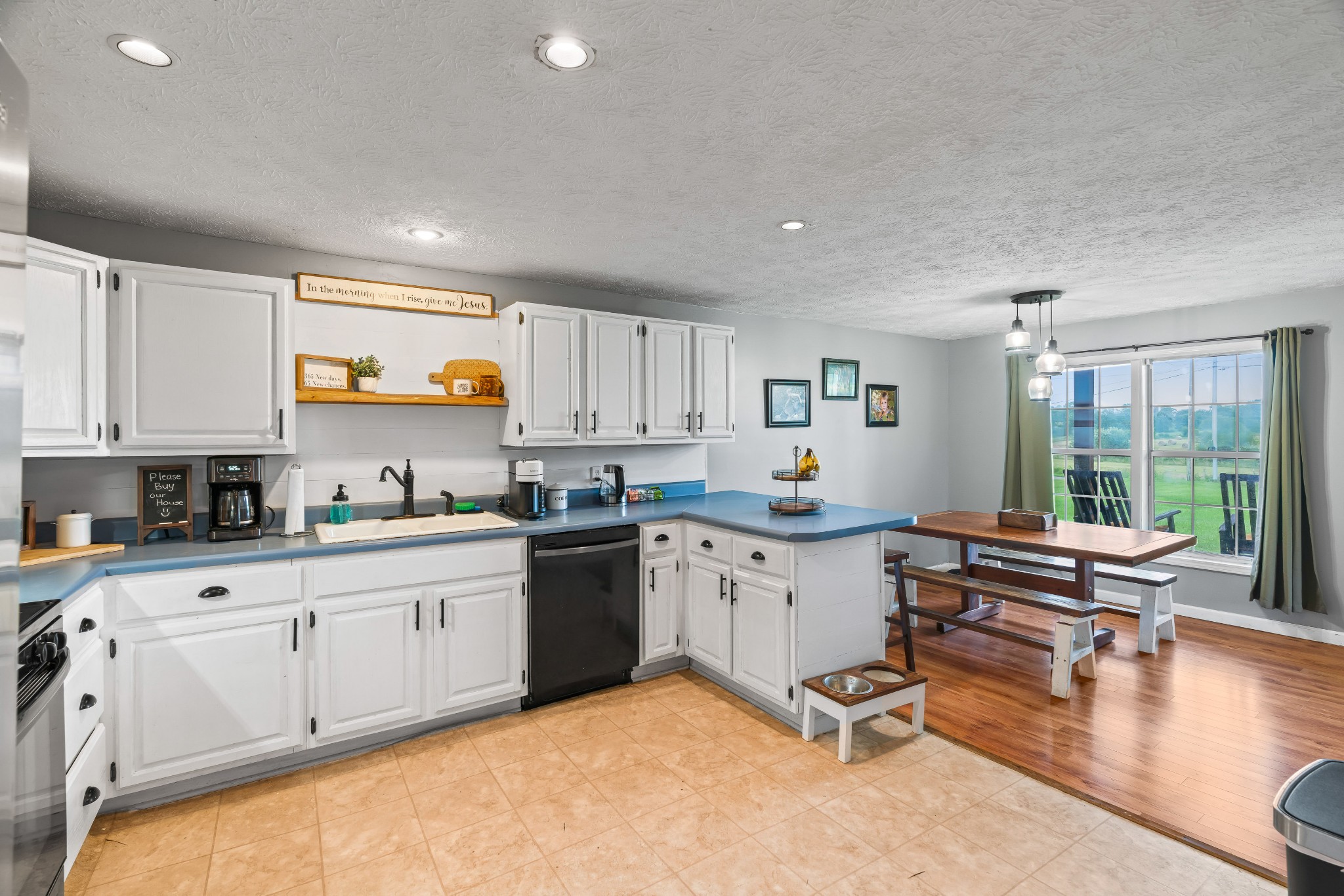 443 Halltown Road Portland, TN 37148 - Photo 23 of 49 a kitchen with sink cabinets and window