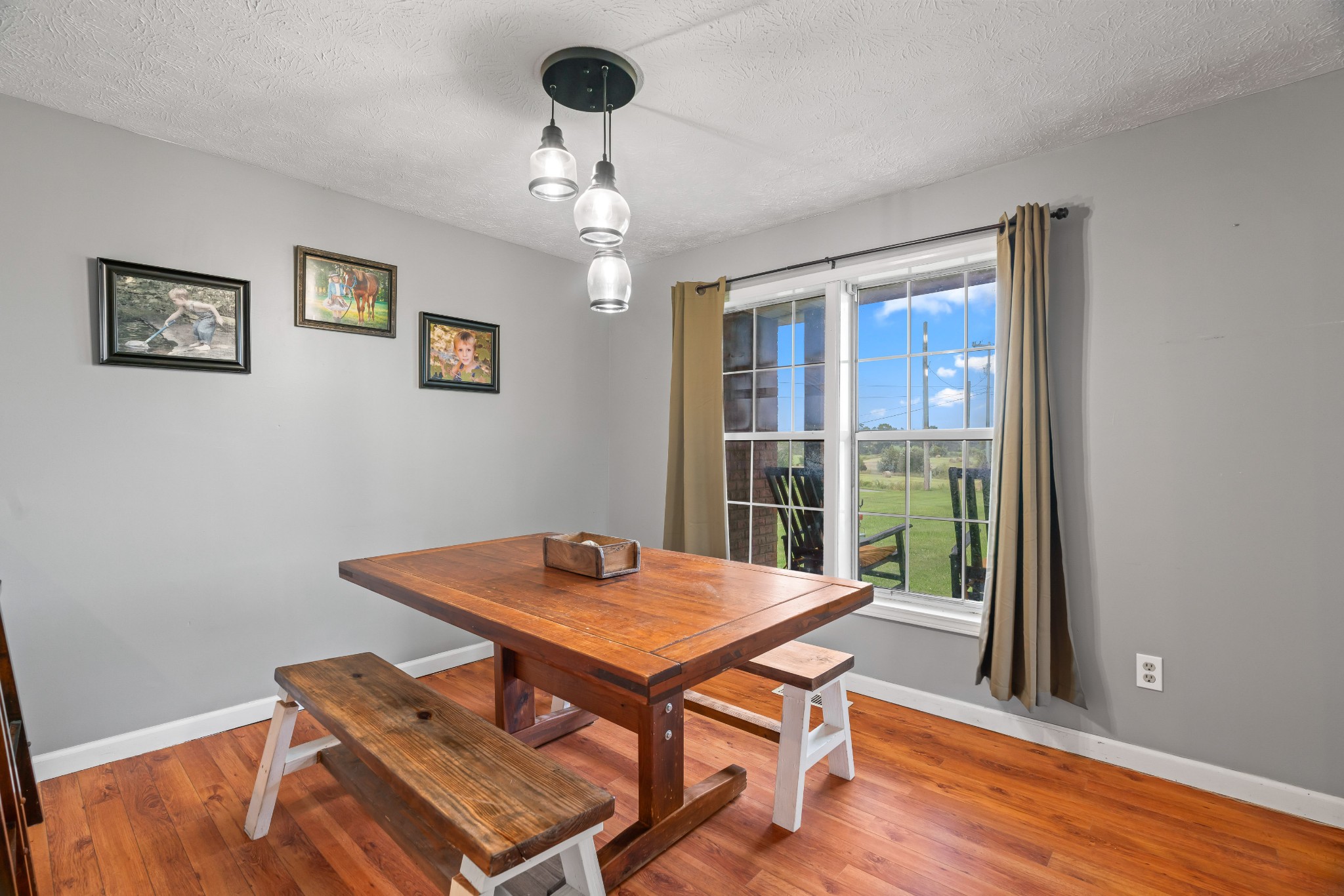 443 Halltown Road Portland, TN 37148 - Photo 26 of 49 a view of a dining room with furniture wooden floor and chandelier