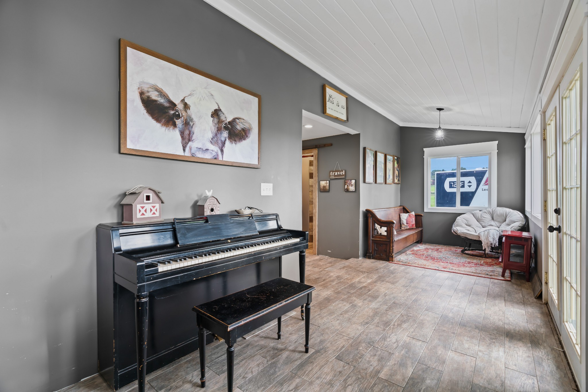 443 Halltown Road Portland, TN 37148 - Photo 34 of 49 a living room with furniture and a piano