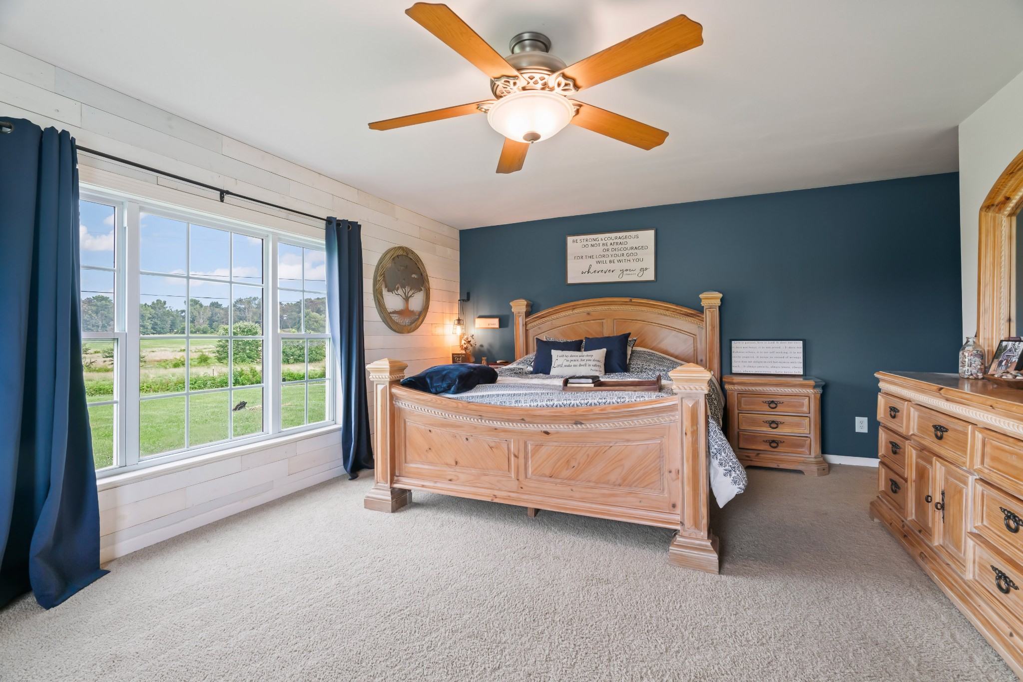 443 Halltown Road Portland, TN 37148 - Photo 37 of 49 a bed room with a bed and a large window