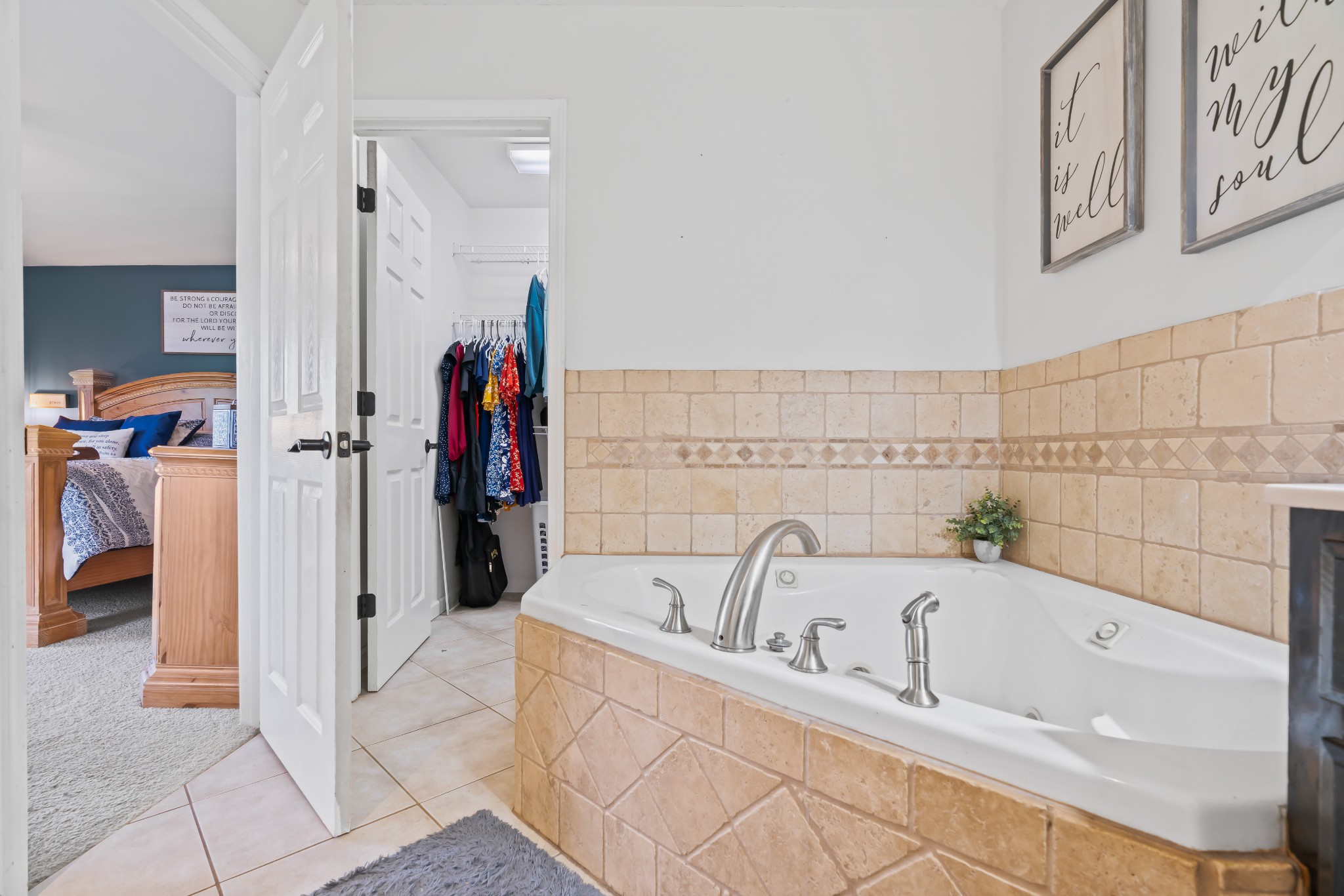 443 Halltown Road Portland, TN 37148 - Photo 38 of 49 a bathroom with a tub a sink and a shower