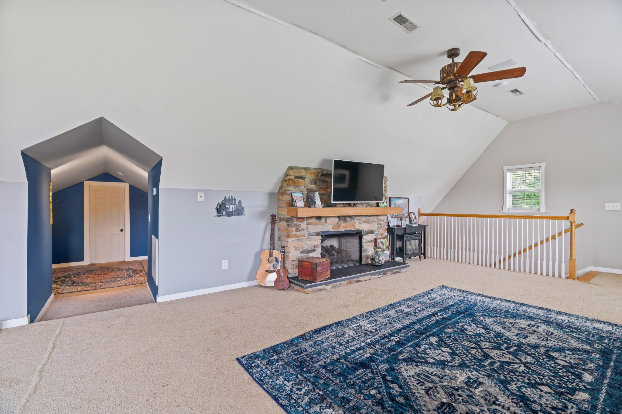 443 Halltown Road Portland, TN 37148 - Photo 43 of 49 a bed room with a bed and a chandelier