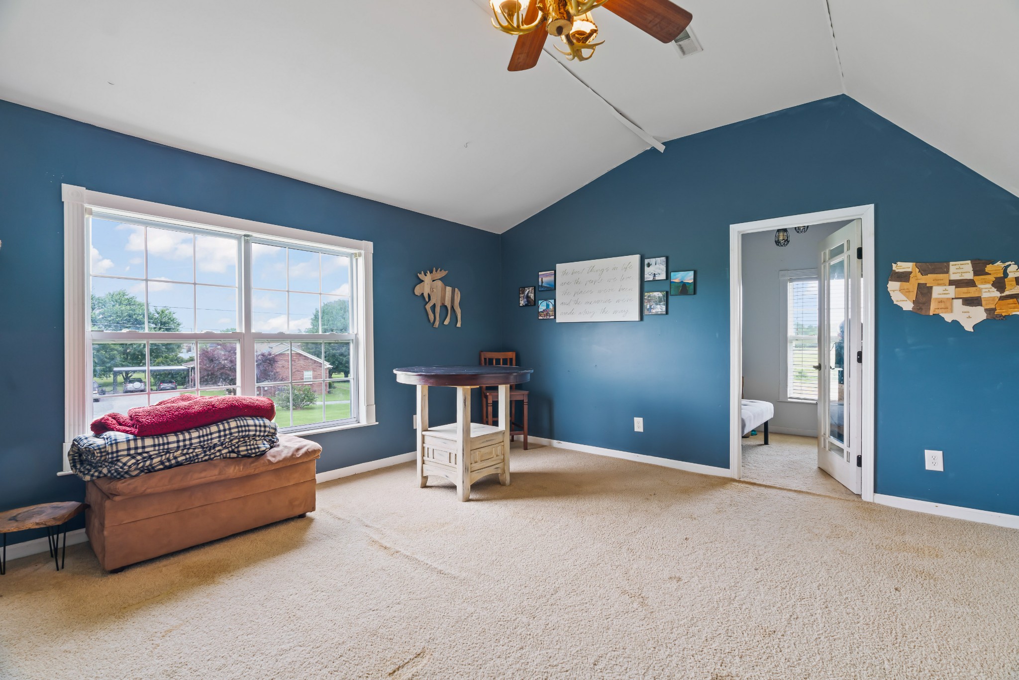 443 Halltown Road Portland, TN 37148 - Photo 44 of 49 a living room with furniture and a floor to ceiling window