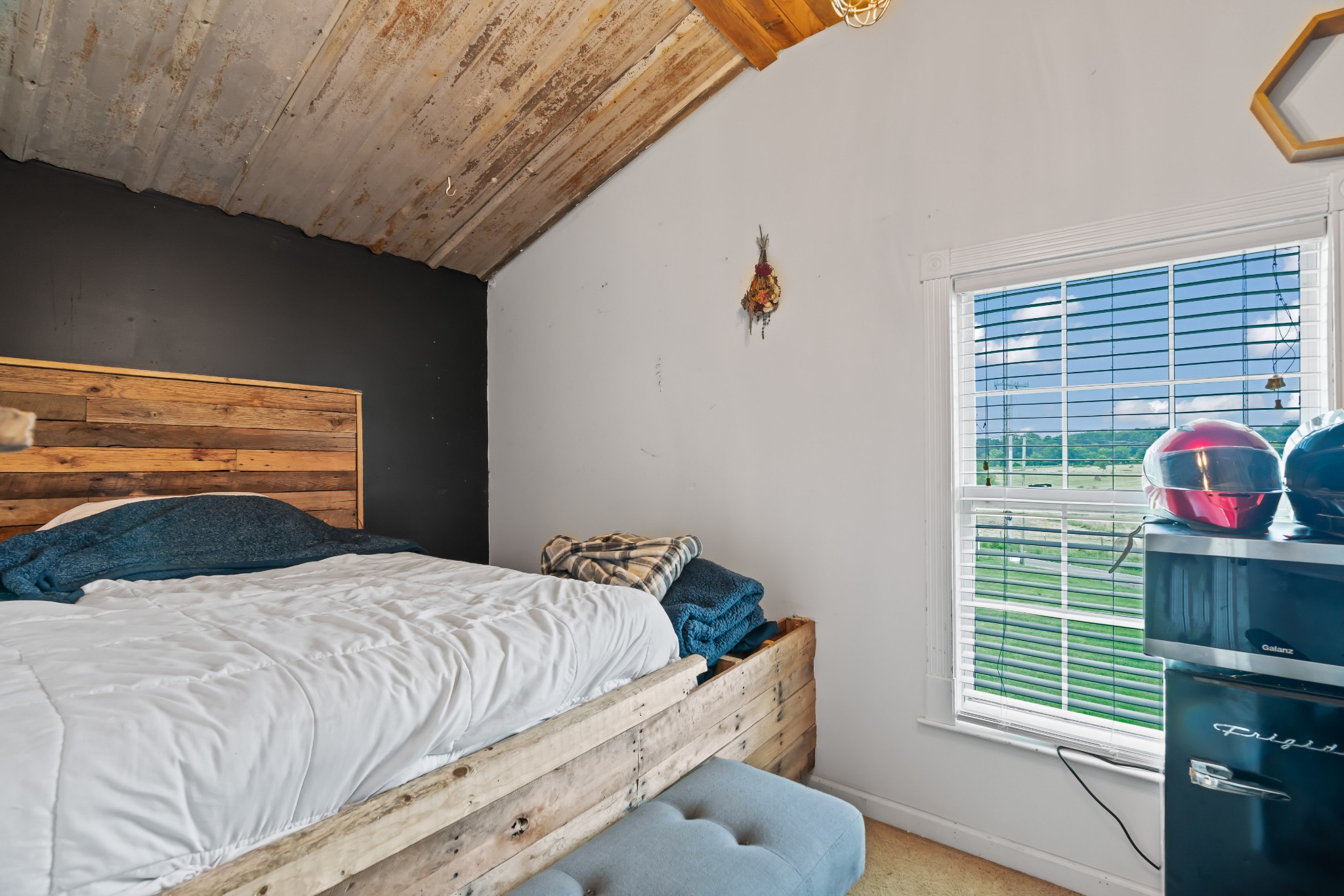 443 Halltown Road Portland, TN 37148 - Photo 46 of 49 a bedroom with a bed and a window