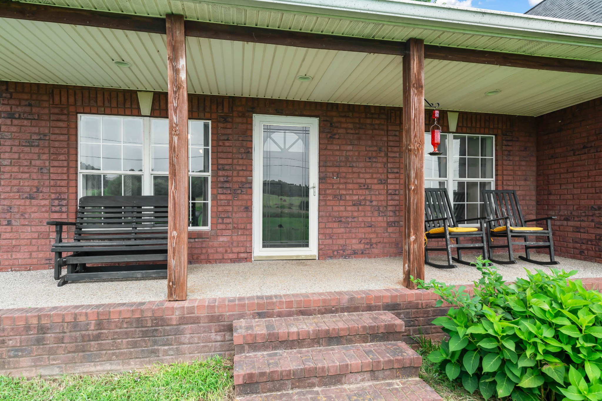 443 Halltown Road Portland, TN 37148 - Photo 5 of 49 a front view of a house with a garden