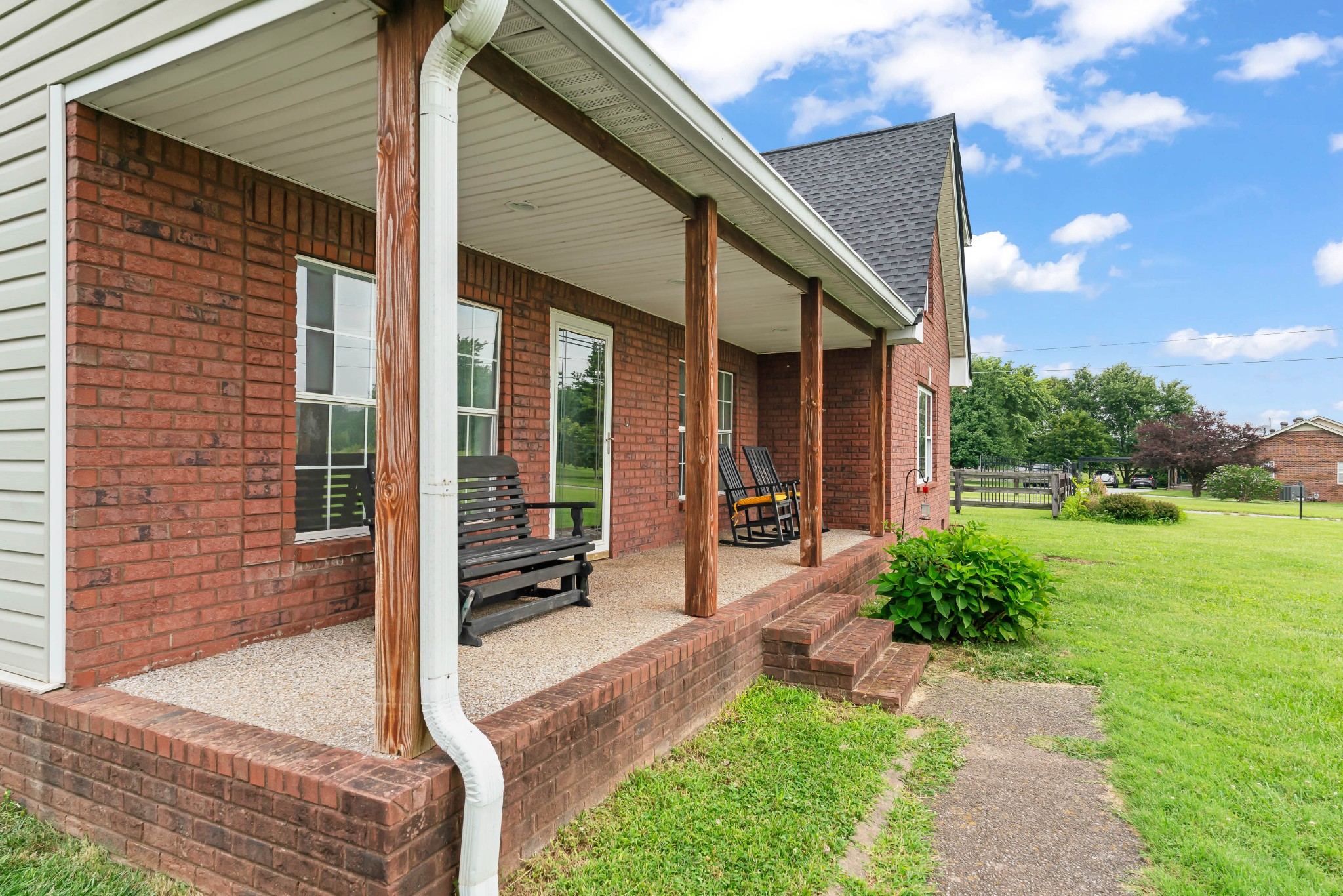 443 Halltown Road Portland, TN 37148 - Photo 6 of 49 a front view of a house with garden
