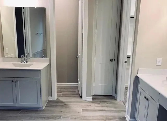 a bathroom with a sink and a bathtub