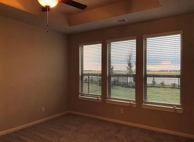 a bathroom with a double vanity sink mirror and shower