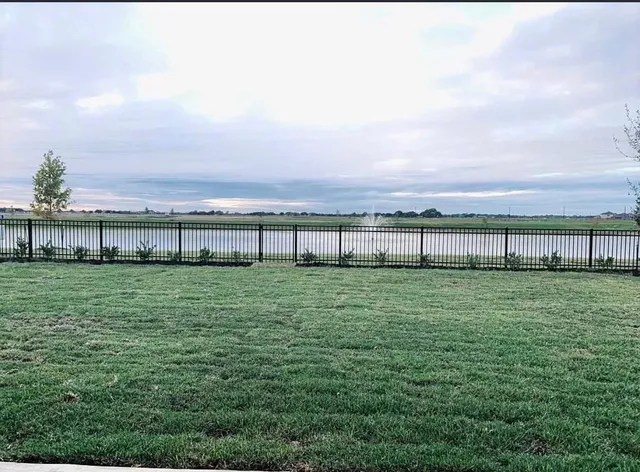 a view of a green yard