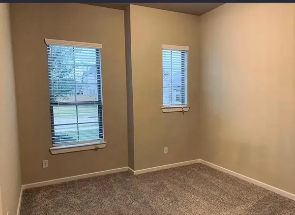a view of a room that has a window in it