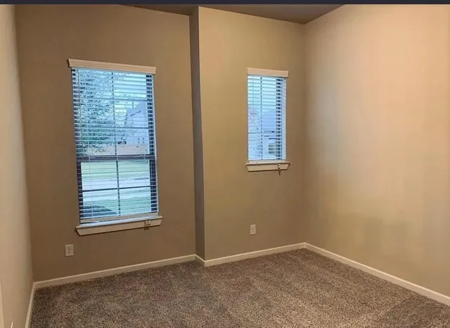 a view of a room that has a window in it