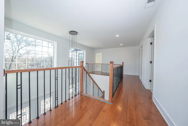 a view of entryway with wooden floor