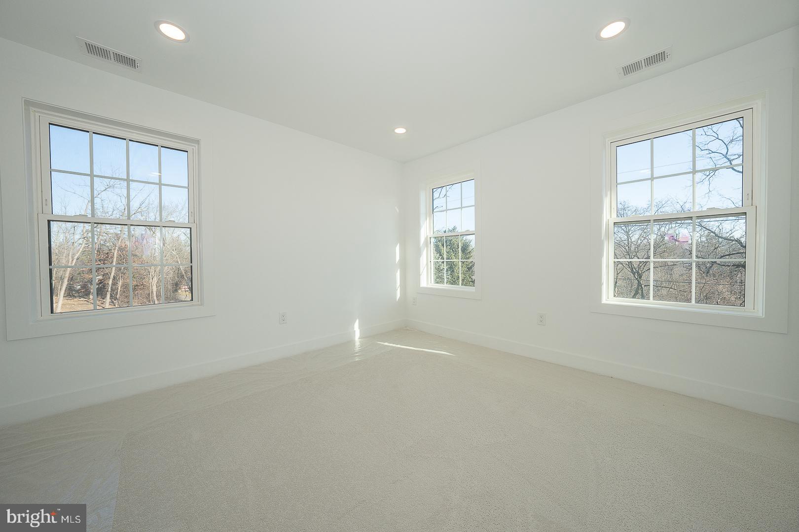 2627 County Line Road Chalfont, PA 18914 - Photo 15 of 37 an empty room with windows