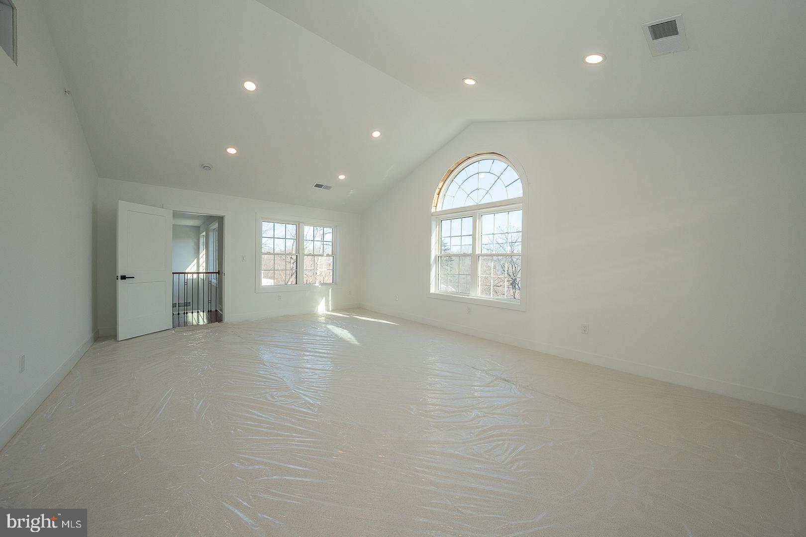 2627 County Line Road Chalfont, PA 18914 - Photo 26 of 37 an empty room with window and wooden floor