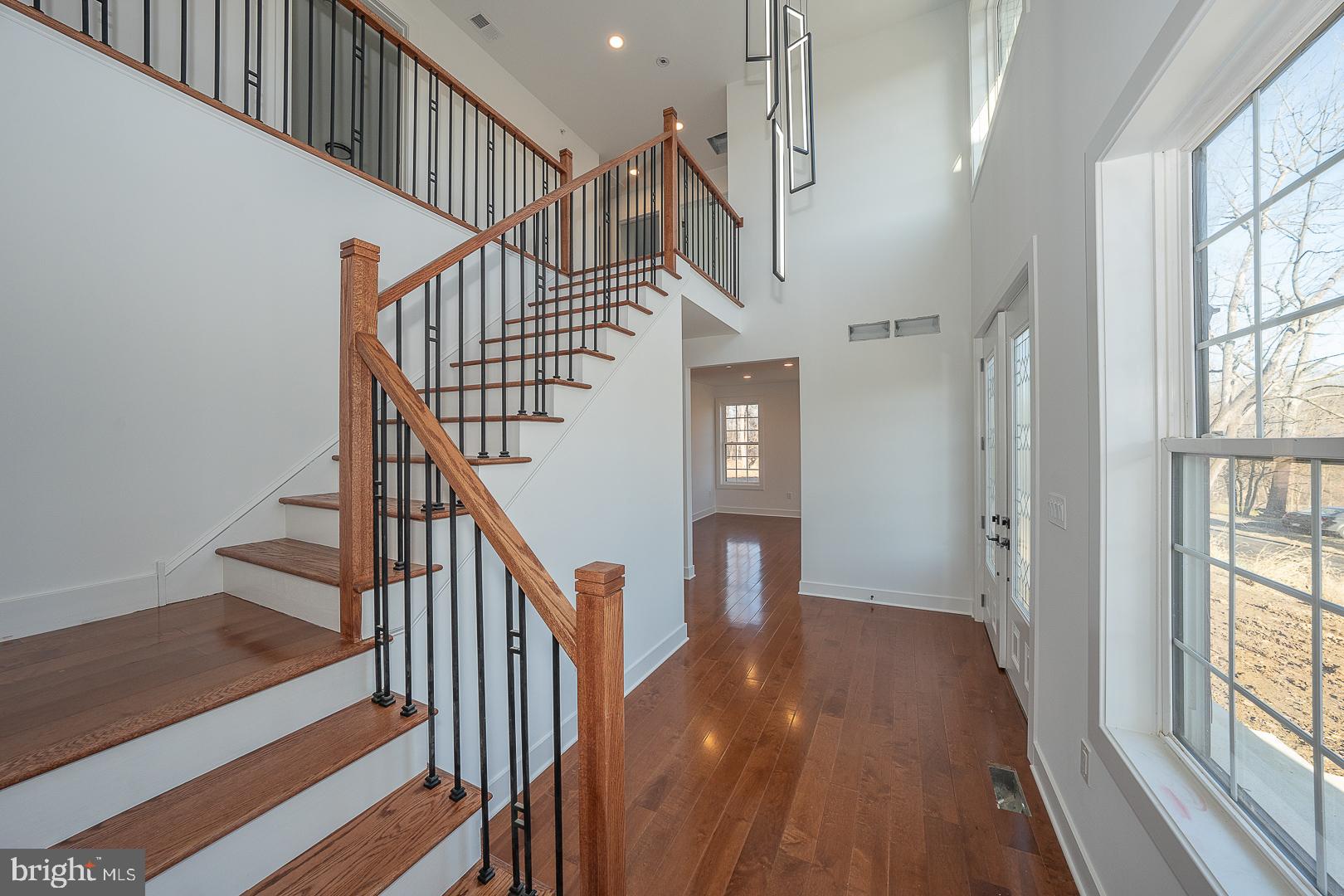 2627 County Line Road Chalfont, PA 18914 - Photo 3 of 37 a view of entryway and hall with wooden floor