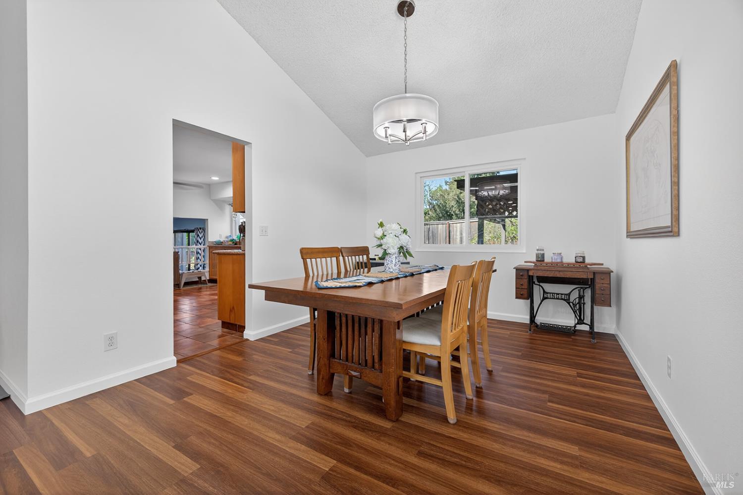 5410 Corbett Circle Santa Rosa, CA 95403 - Photo 8 of 41 a view of a dining room with furniture window and wooden floor