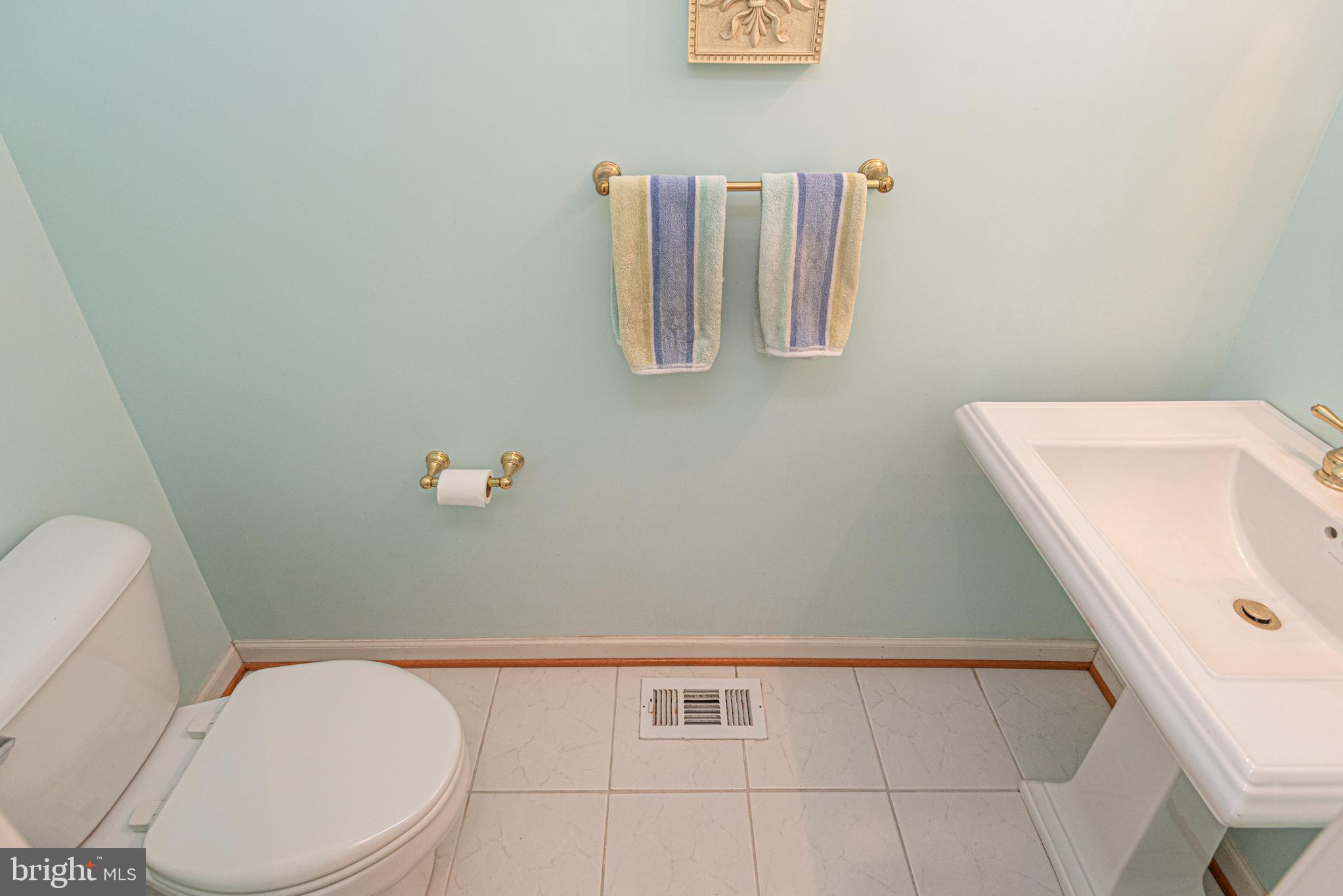 263 Oyster Shell Cove Bethany Beach, DE 19930 - Photo 17 of 50 a white toilet sitting next to a shower