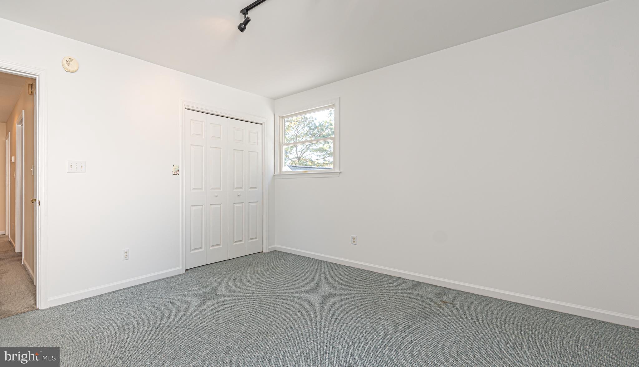 263 Oyster Shell Cove Bethany Beach, DE 19930 - Photo 31 of 50 an empty room with a window