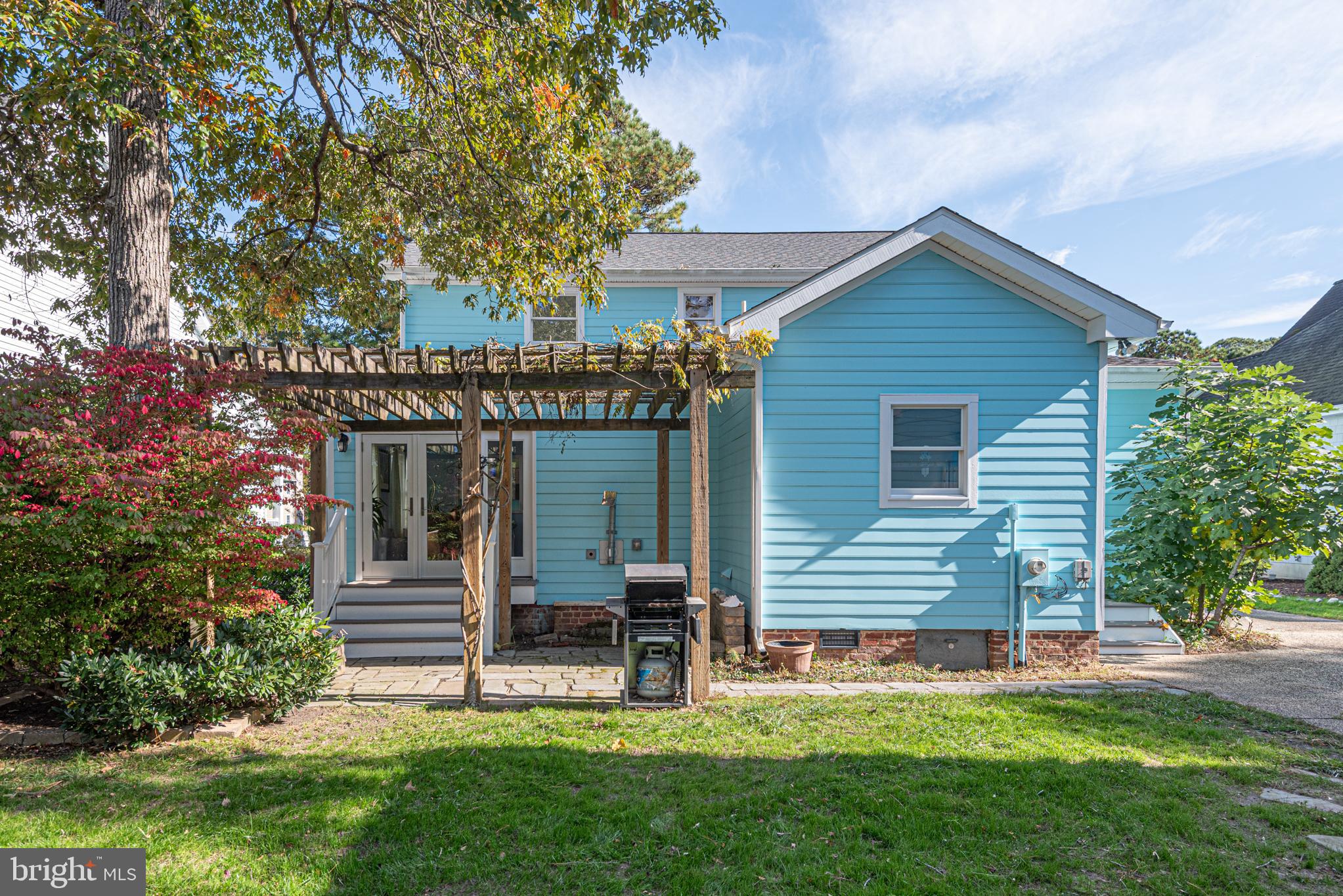 263 Oyster Shell Cove Bethany Beach, DE 19930 - Photo 40 of 50 a view of a house with a yard
