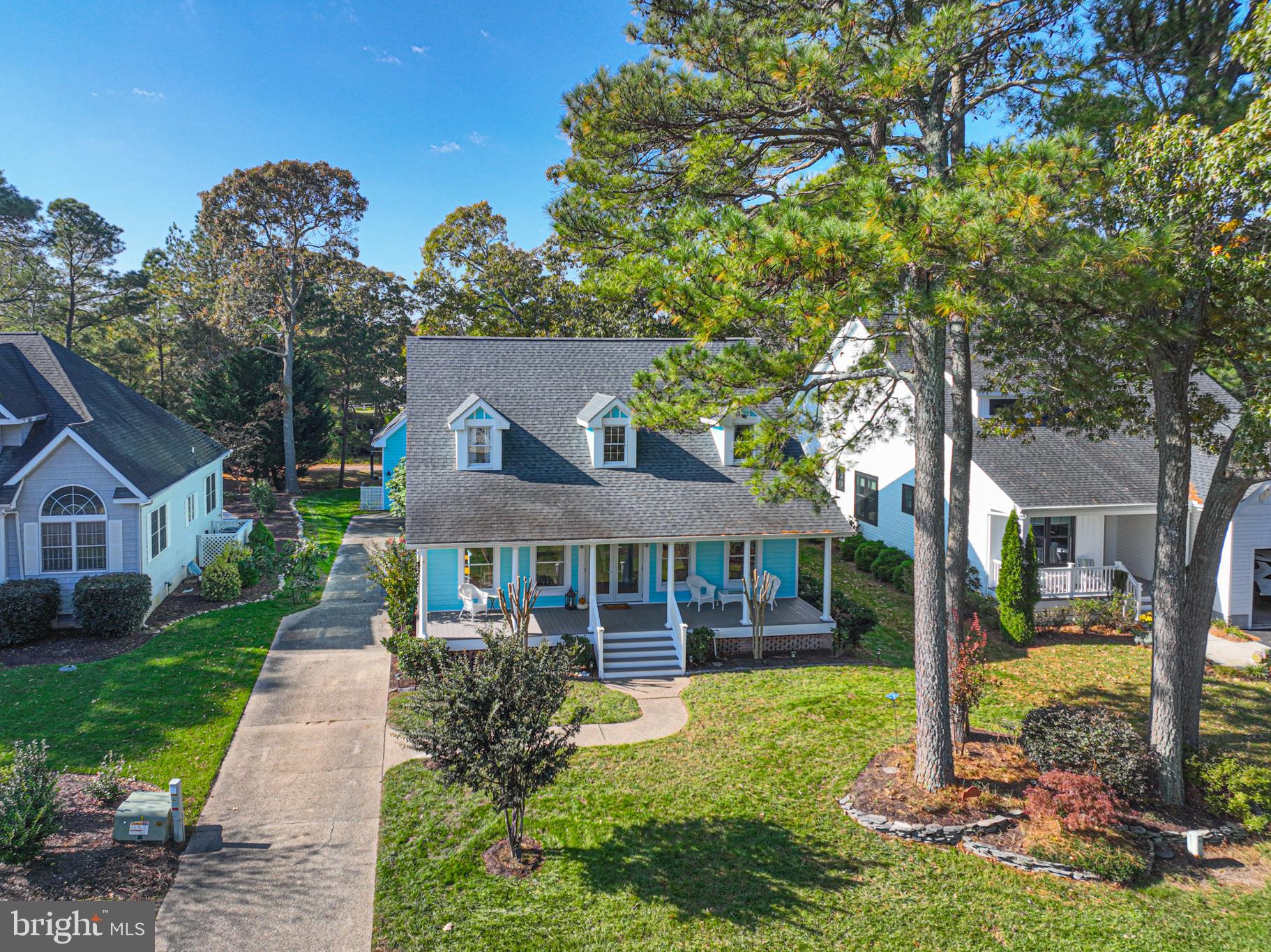 263 Oyster Shell Cove Bethany Beach, DE 19930 - Photo 41 of 50 a front view of a house with garden