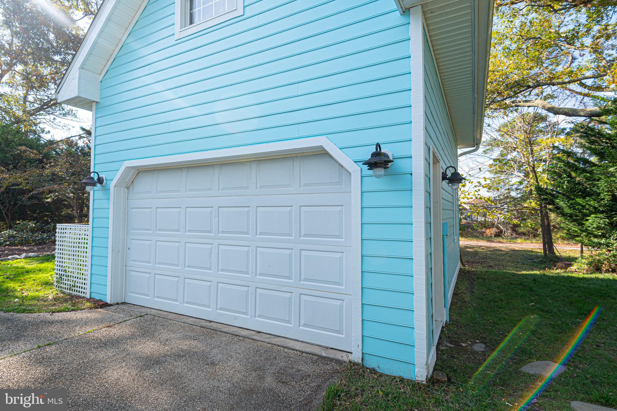 263 Oyster Shell Cove Bethany Beach, DE 19930 - Photo 50 of 50 a view of a house with a backyard