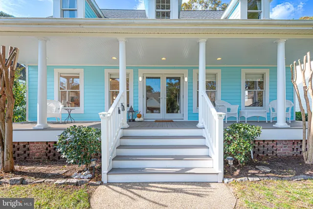 a view of a building with a potted plant windows