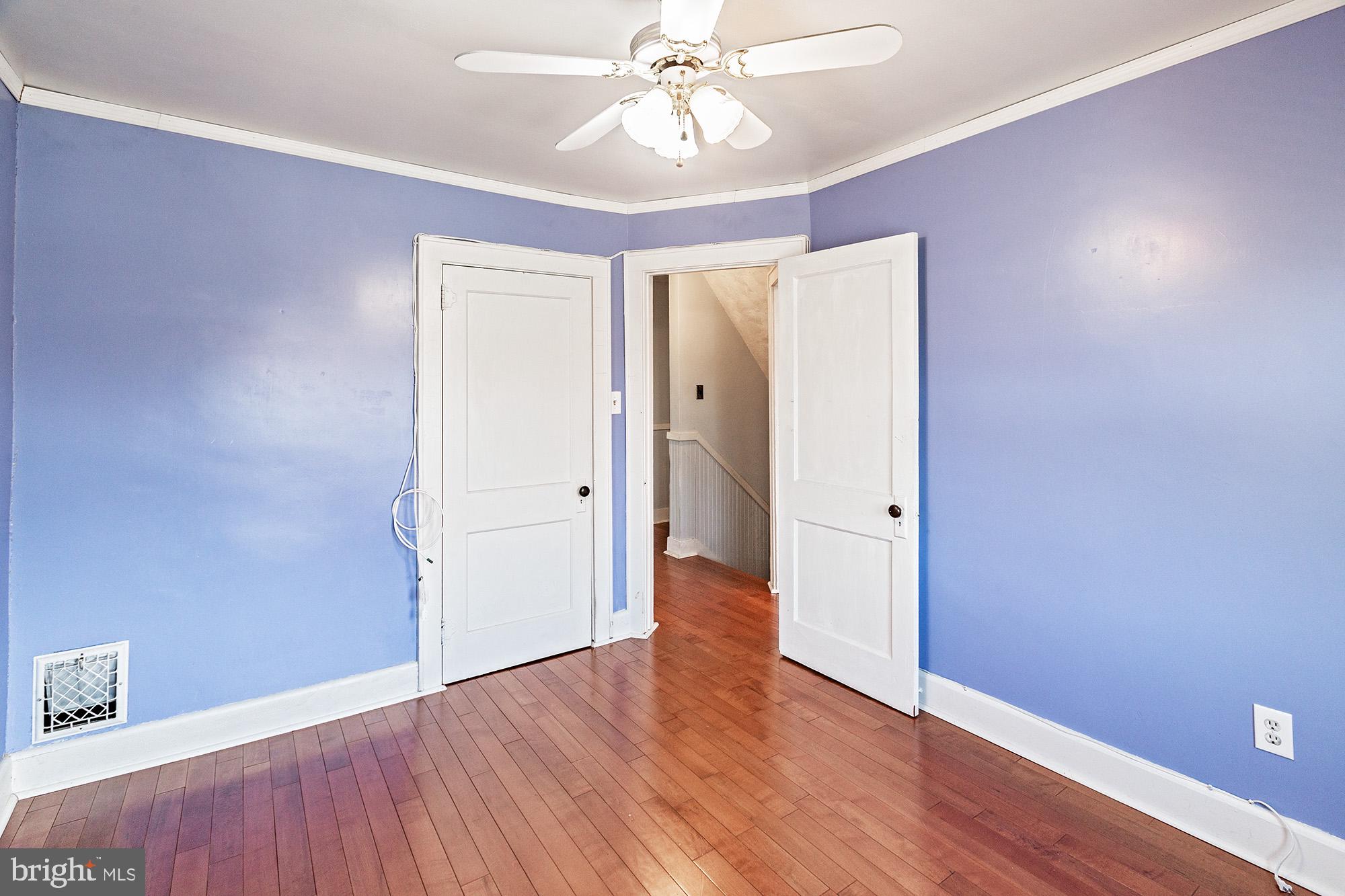 284 Morrison Avenue Salem, NJ 08079 - Photo 16 of 34 wooden floor in an empty room with a window