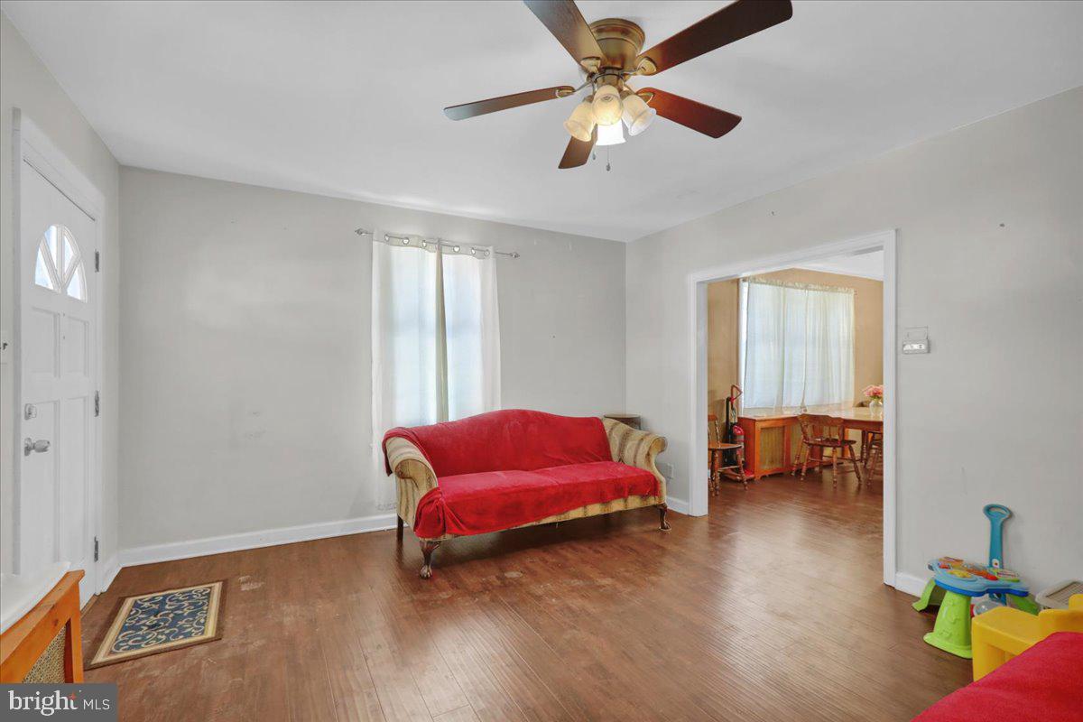 224 Hanley Place Reading, PA 19611 - Photo 6 of 19 a living room with furniture and a window