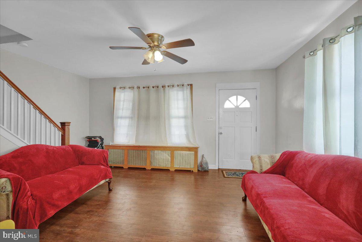 224 Hanley Place Reading, PA 19611 - Photo 7 of 19 a living room with furniture and a large window