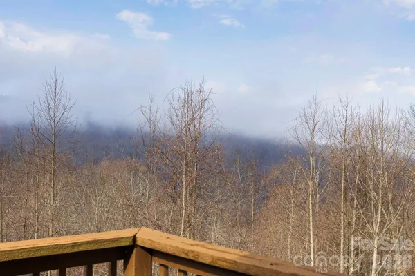 a view of balcony and trees