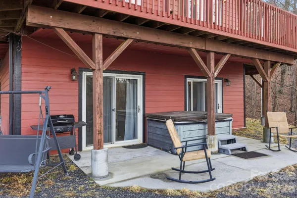 a patio with table and chairs
