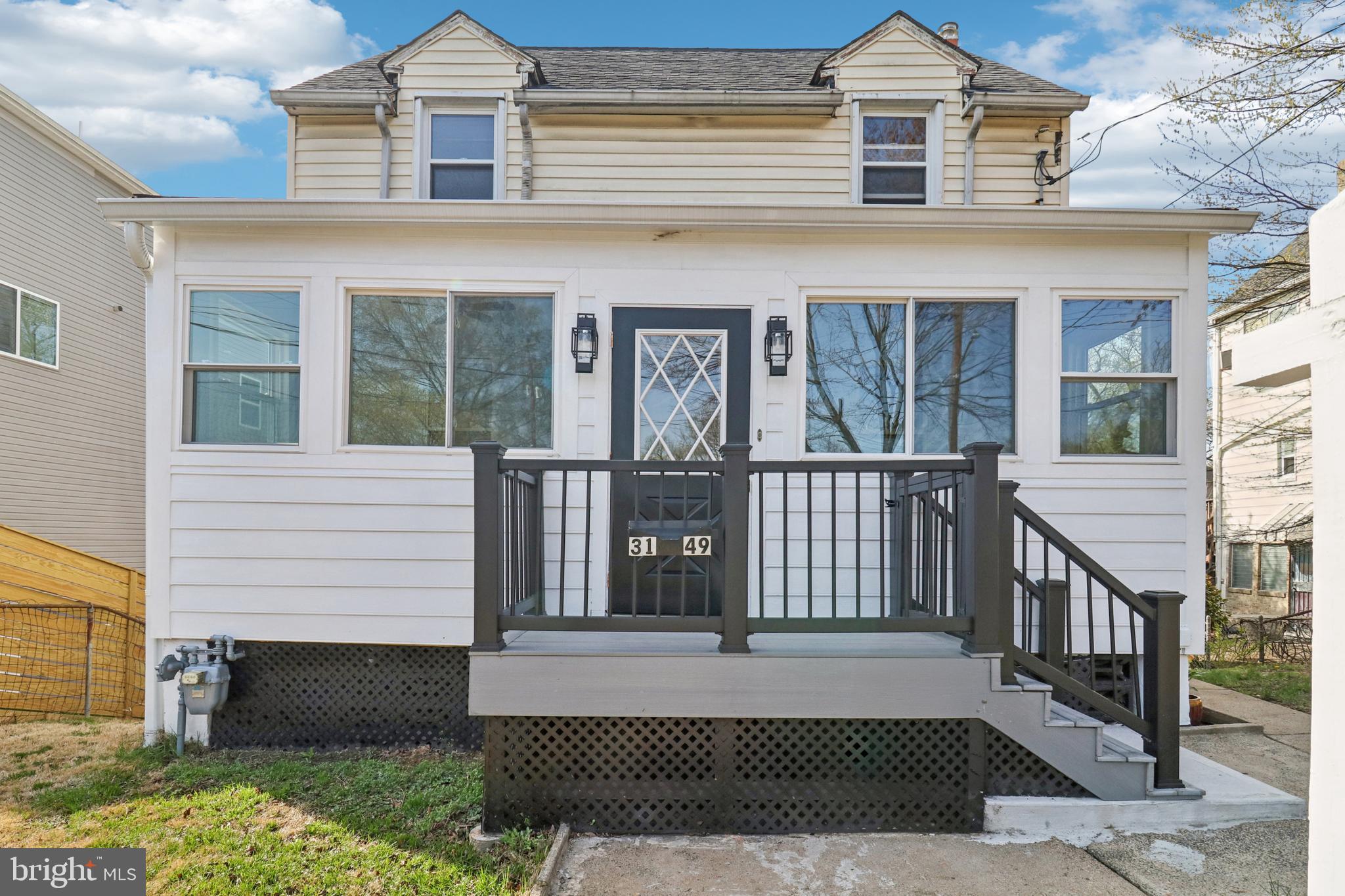3149 Newton Street Northeast Washington, DC 20018 - Photo 1 of 57 Large enclosed front porch for use year round.