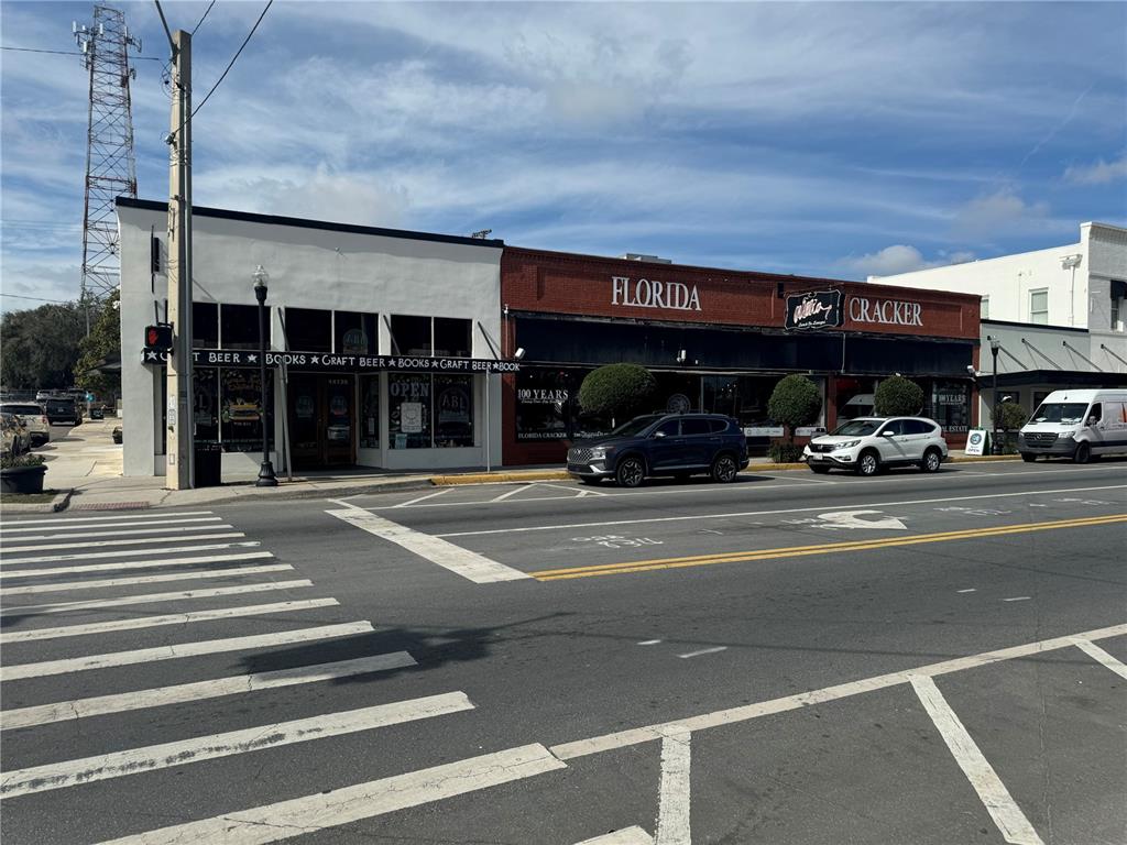 14907 Lucca Way Dade City, FL 33523 - Photo 44 of 46 a view of a building with a street