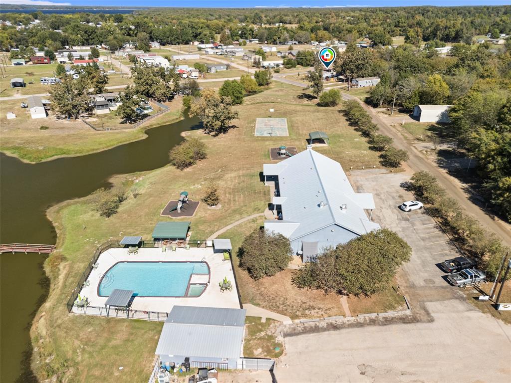 454 Geronimo Quitman, TX 75783 - Photo 2 of 37 an aerial view of a house with a ocean view