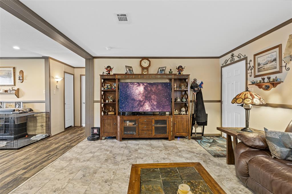 454 Geronimo Quitman, TX 75783 - Photo 21 of 37 a living room with furniture and a flat screen tv