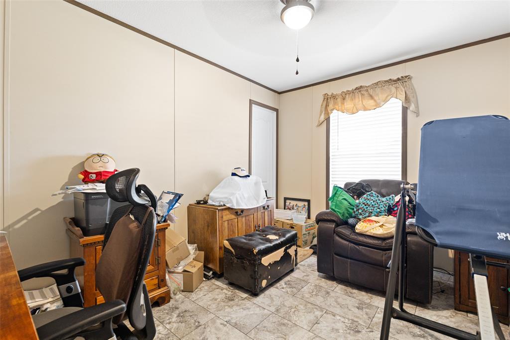 454 Geronimo Quitman, TX 75783 - Photo 26 of 37 a living room with furniture and a potted plant