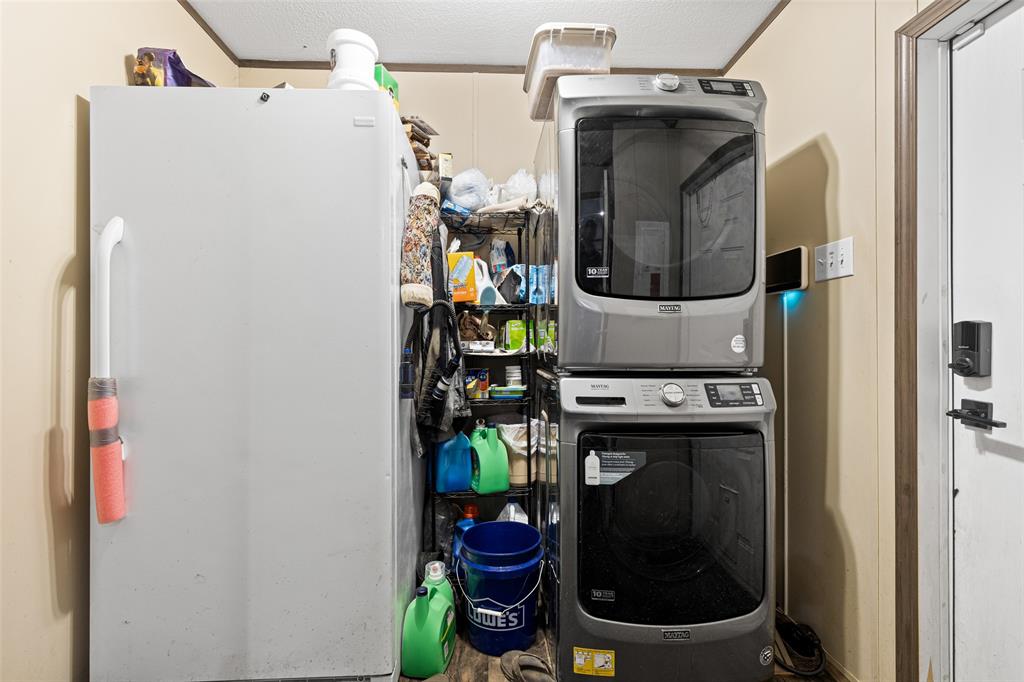 454 Geronimo Quitman, TX 75783 - Photo 29 of 37 a utility room with dryer and washer