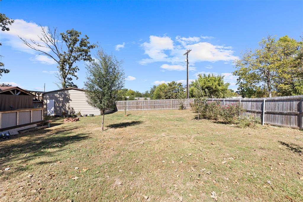 454 Geronimo Quitman, TX 75783 - Photo 30 of 37 a view of backyard with green space
