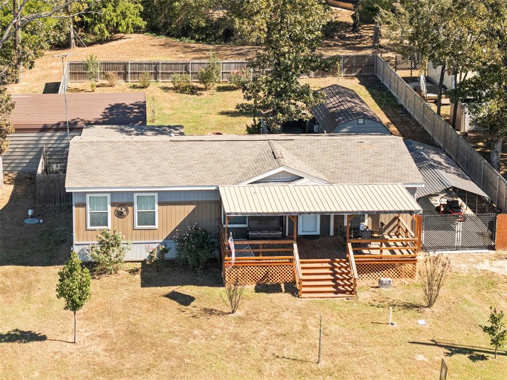 454 Geronimo Quitman, TX 75783 - Photo 32 of 37 a front view of a house with a yard
